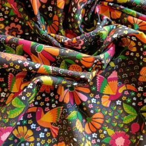 Popelín negro con tucanes y flores