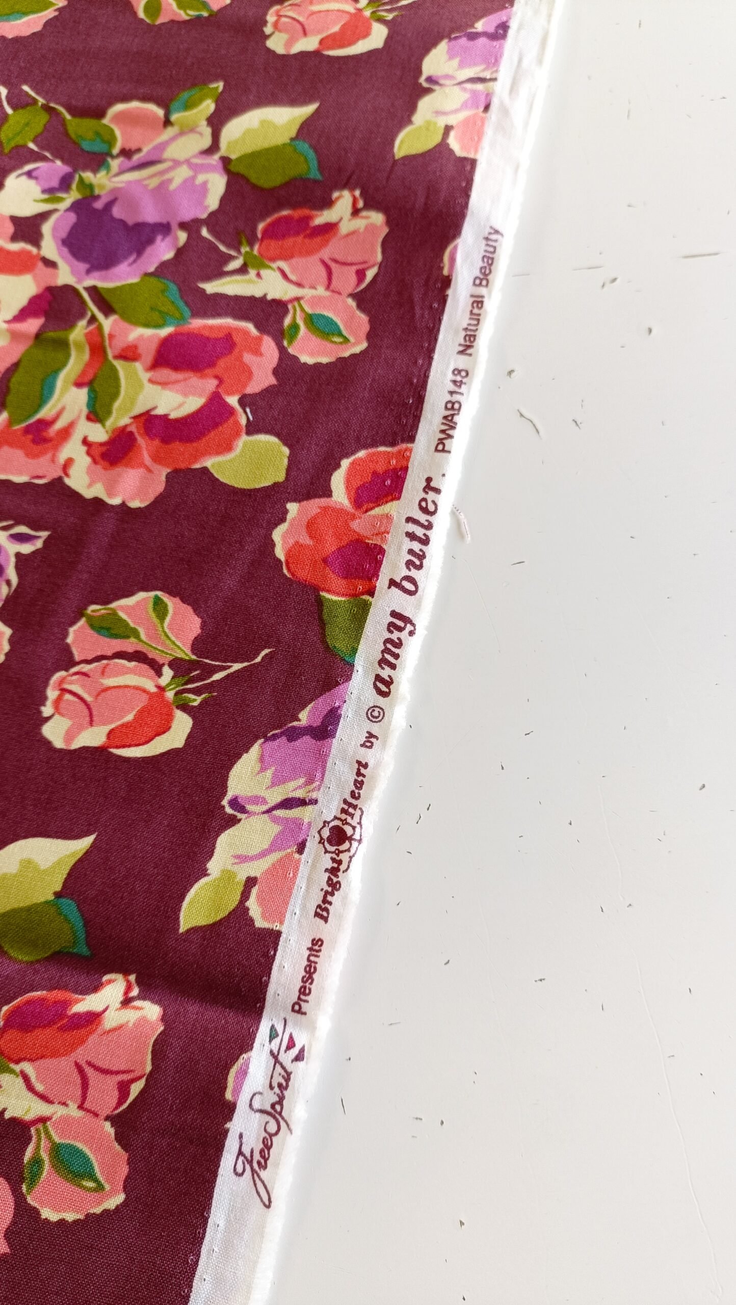 algodón burdeos con flores