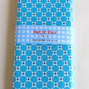 Retal impermeable blanca con lunares azules