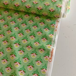 Algodón americano verde con flores de ranúnculo